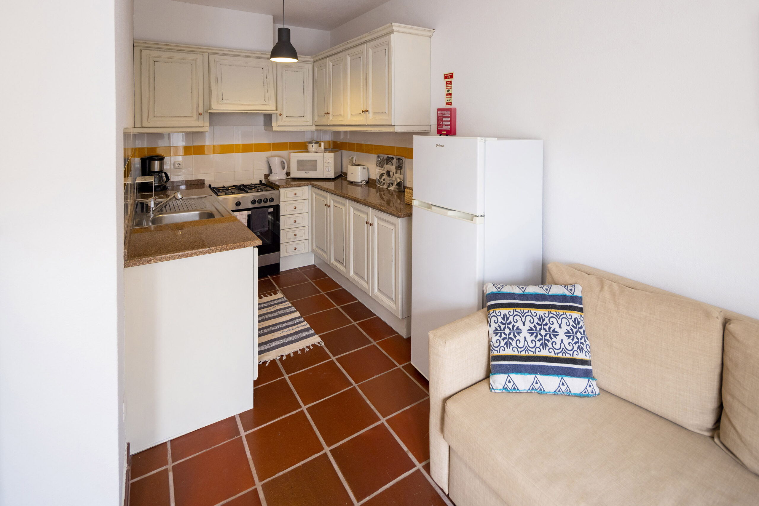 Apartment Monserrate has a living room with kitchenette and a sofa bed